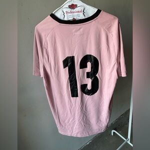 Pink Men's Soccer Jersey with Black Shorts